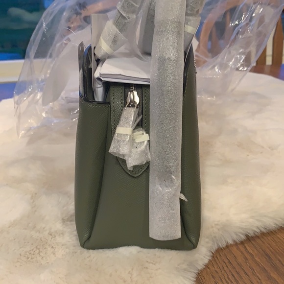 NWT. Coach Minicarryall - Picture 7 of 7